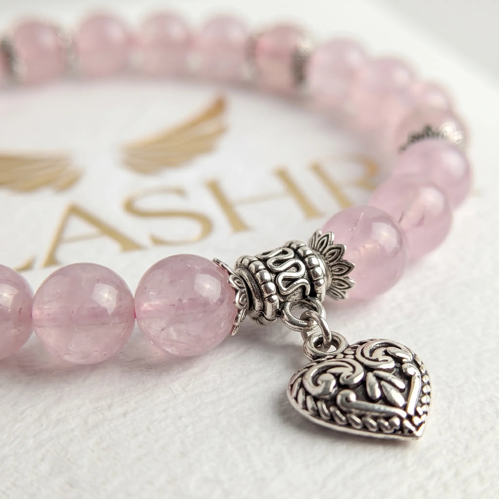 Natural rose quartz crystal bracelet bead detail — genuine blush-pink gemstone Kaashir