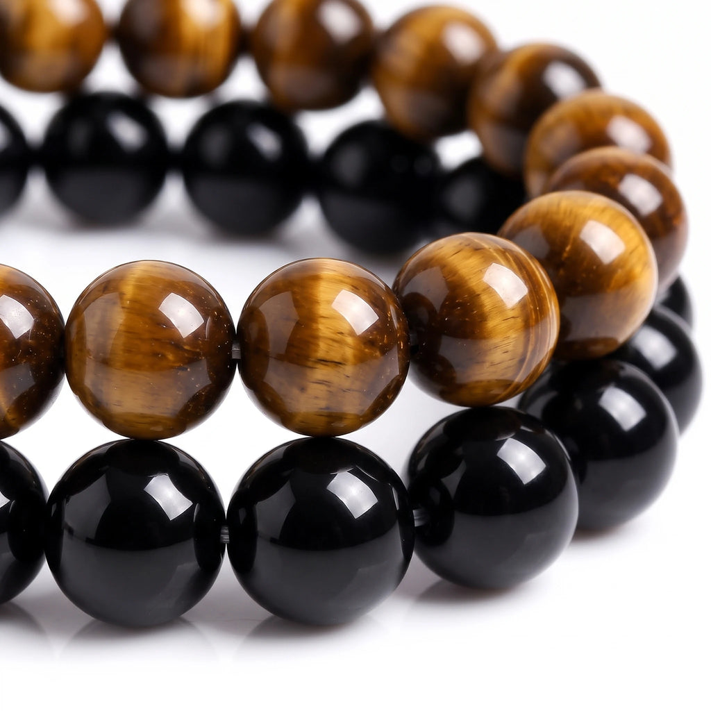 Close-up of Tiger Eye and Black Obsidian 8mm gemstone bracelets