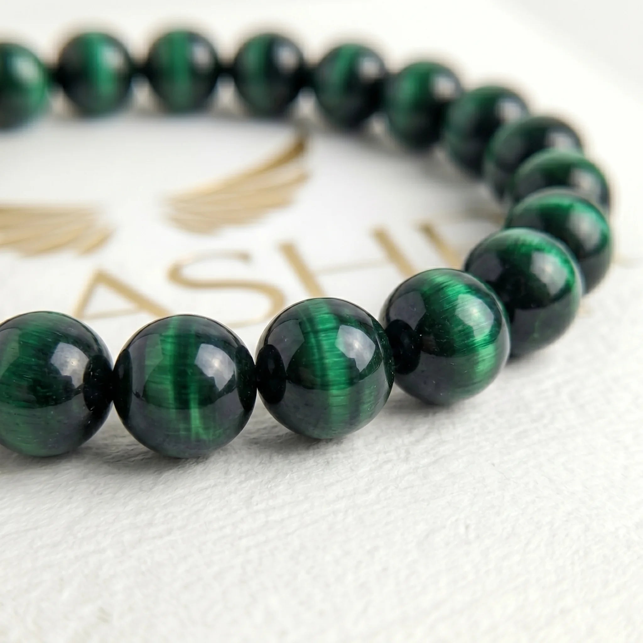 tiger eye green bracelet natural stone beads close up detail