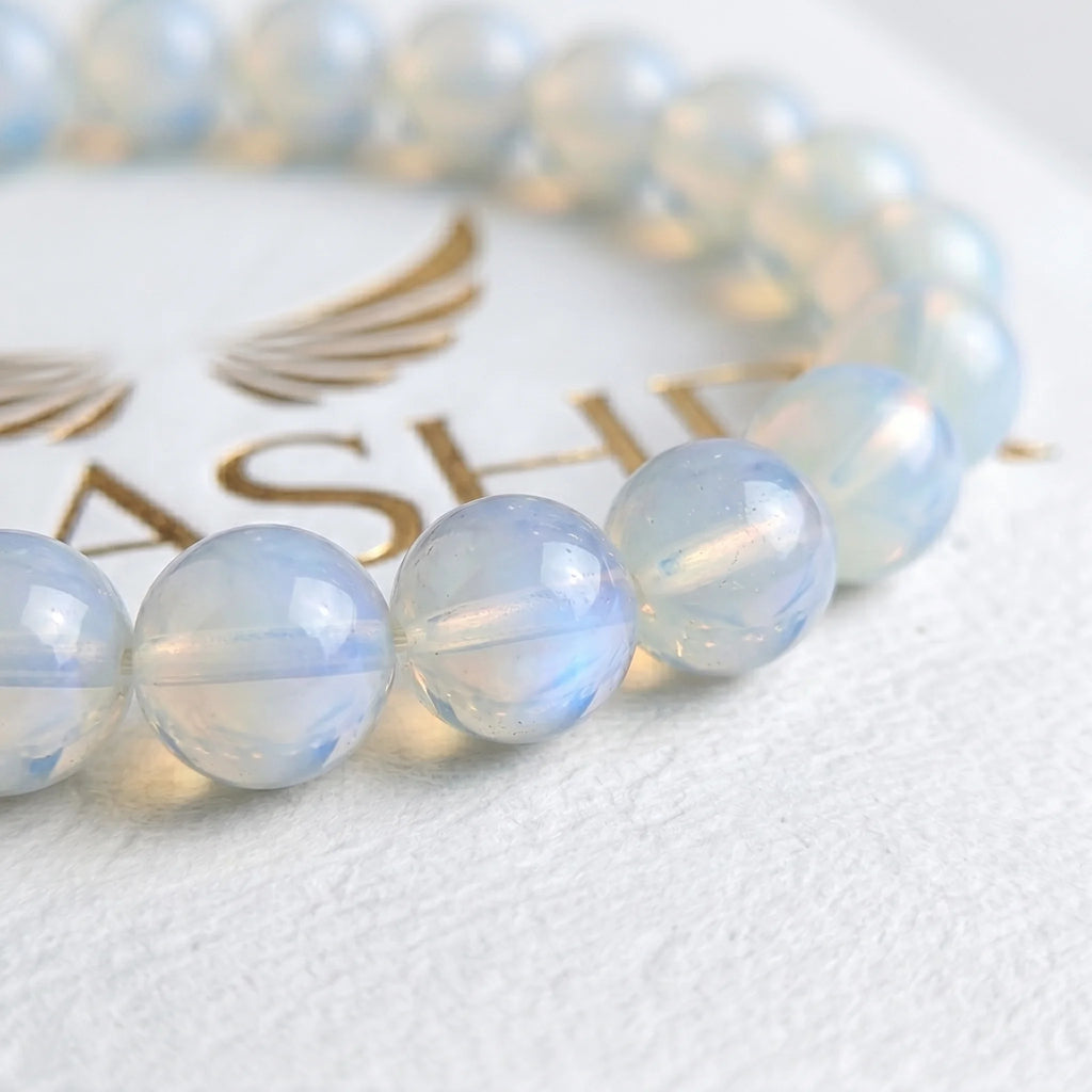 white opal bead bracelet close up showing iridescent play of color