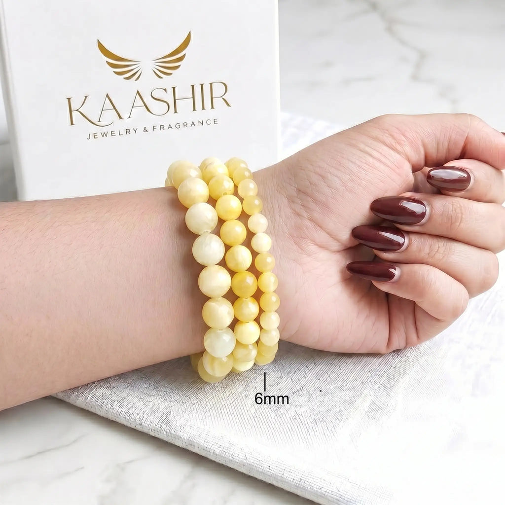yellow Jade 6mm Beaded Gemstone Bracelet worn on wrist – Kaashir Jewelry