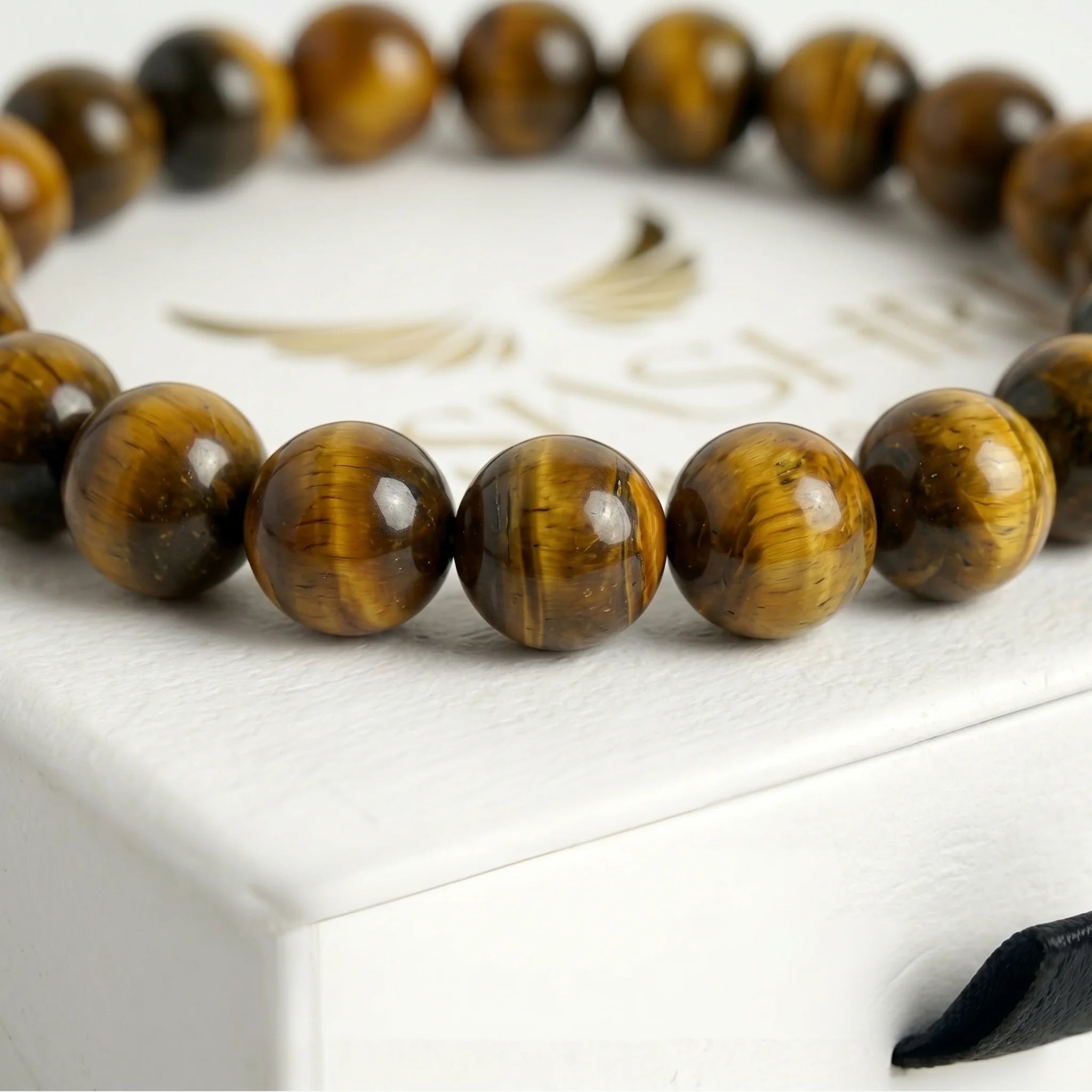 yellow tiger eye bracelet natural stone beads close up detail